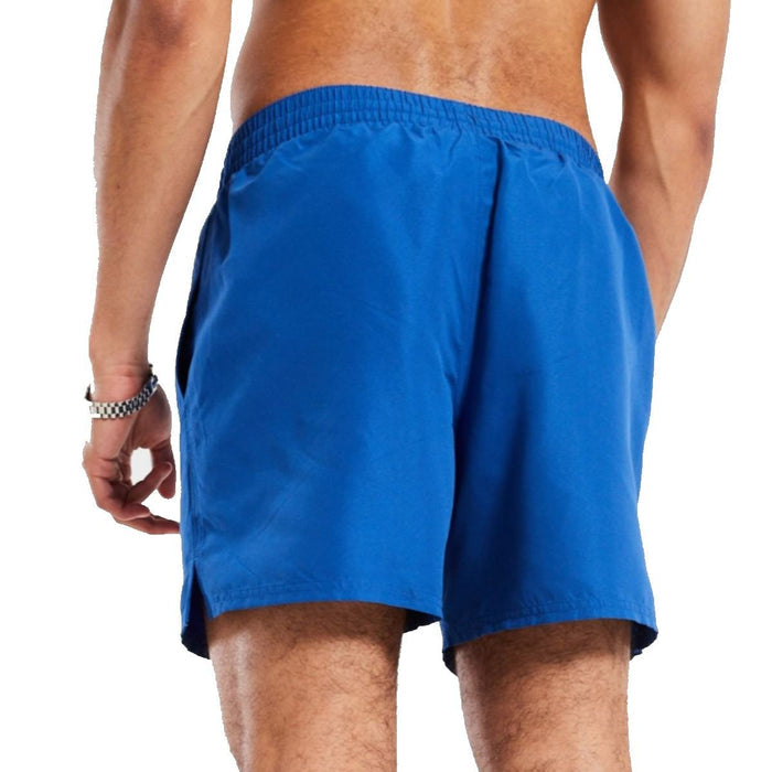 Nike 5-inch electric blue swim shorts featuring Nike branding, lightweight design, and sporty fit for active water activities.