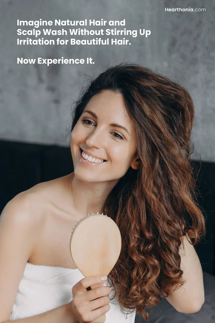 happy woman combing her healthy hair with text reading imagine natural hair and scalp wash without stirring up irritation for beautiful hair.