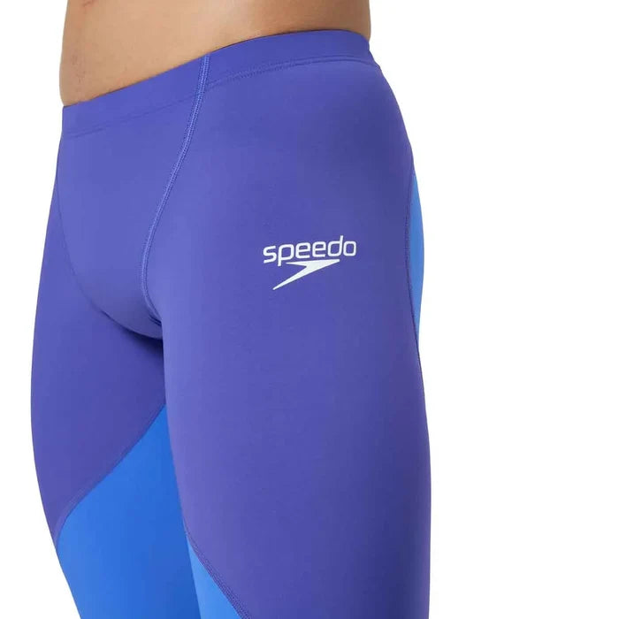 Speedo men's Fastskin LZR Ignite jammer in purple, close-up of the sleek swim jammers designed for competitive swimming.