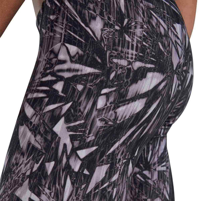 TYR men's Fragment jammer swimsuit in titanium color, close-up view showing the fitted swimwear design and TYR branding.