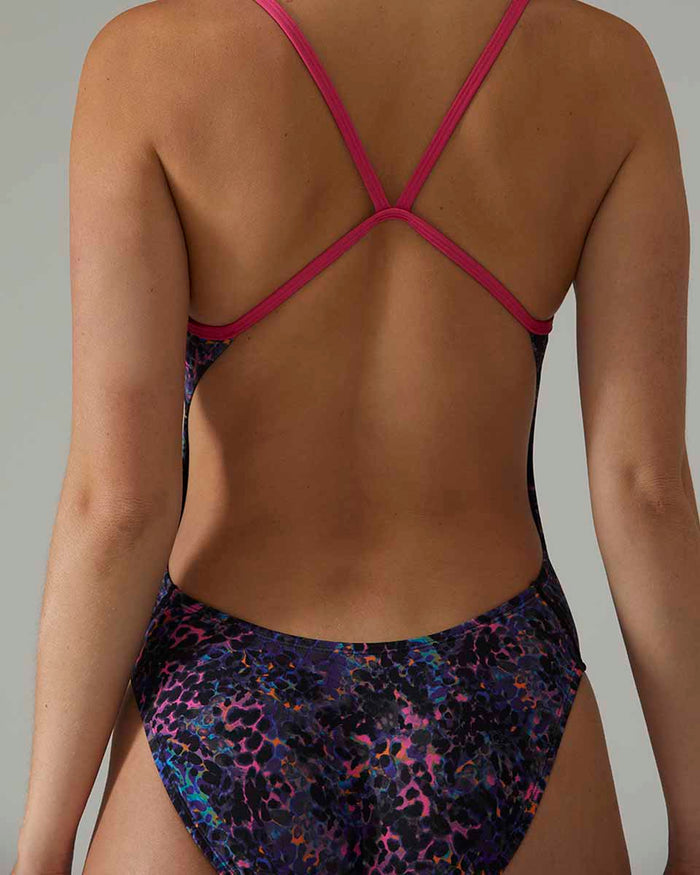 TYR women's stipple cutout swimsuit in petunia color, featuring a stylish design with cutouts and supportive fit.
