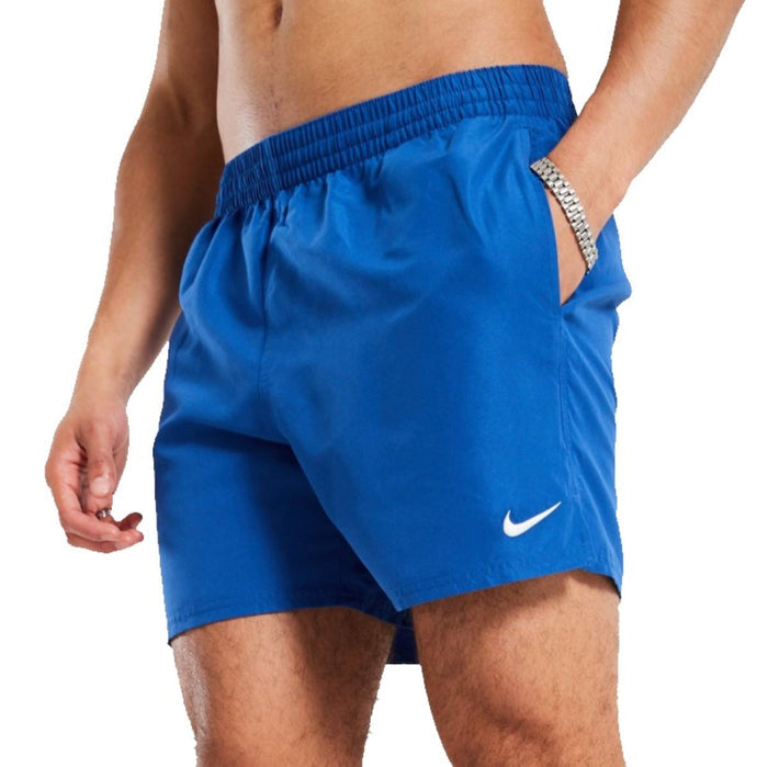 Nike 5-inch electric blue swim shorts featuring Nike branding and a lightweight, quick-drying fabric for comfortable swimming.