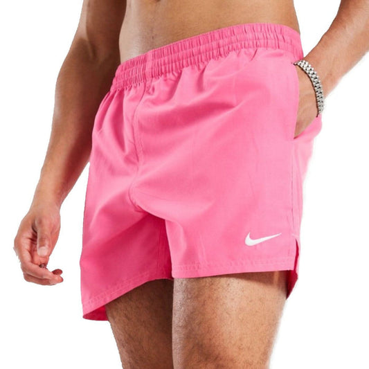 Nike 5-inch pink swim shorts featuring a lightweight design and elastic waistband, ideal for active beach or pool days.