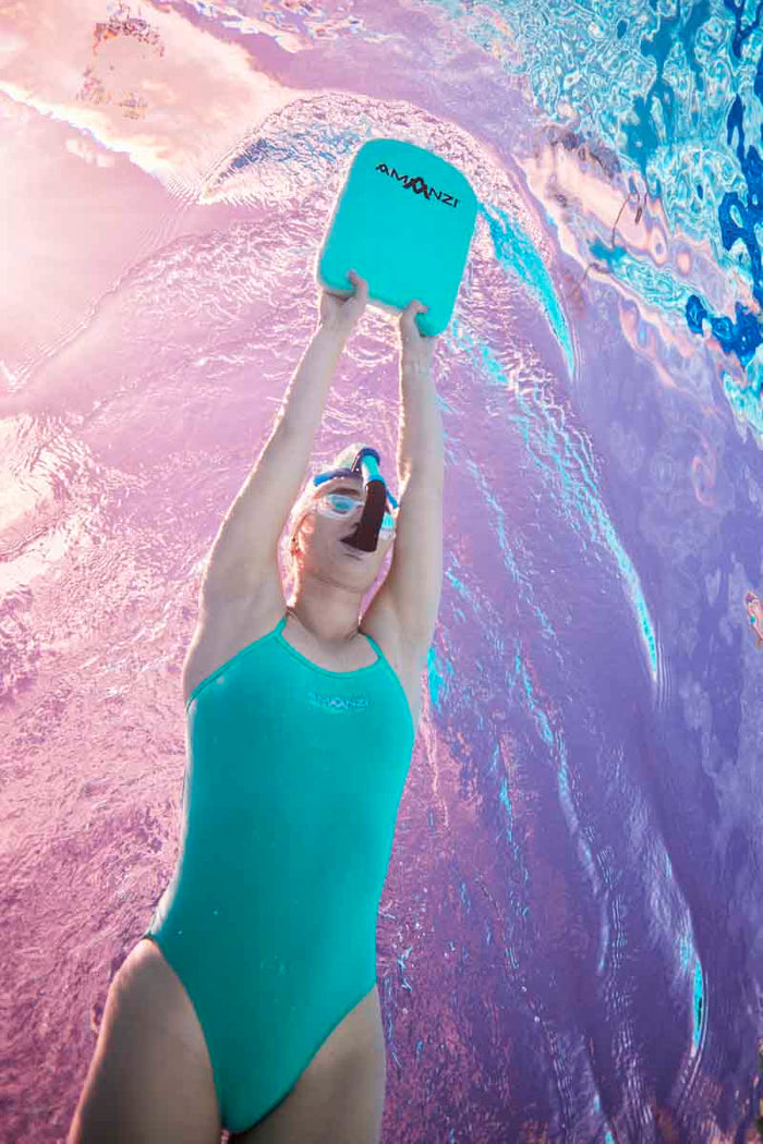Amani Women's Spearmint Proback One-Piece Swimsuit in green, featuring a sleek design and supportive fit, perfect for swimming.