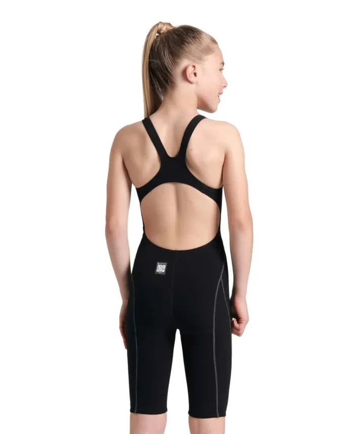 Arena Girls Powerskin Impulso Kneesuit in black and teal, featuring a sleek design ideal for competitive swimming.