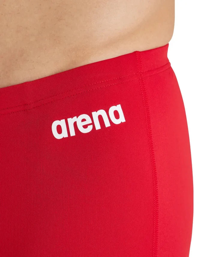 Arena men's team swim solid jammer shorts, navy blue with the Arena logo, designed for competitive swimming.
