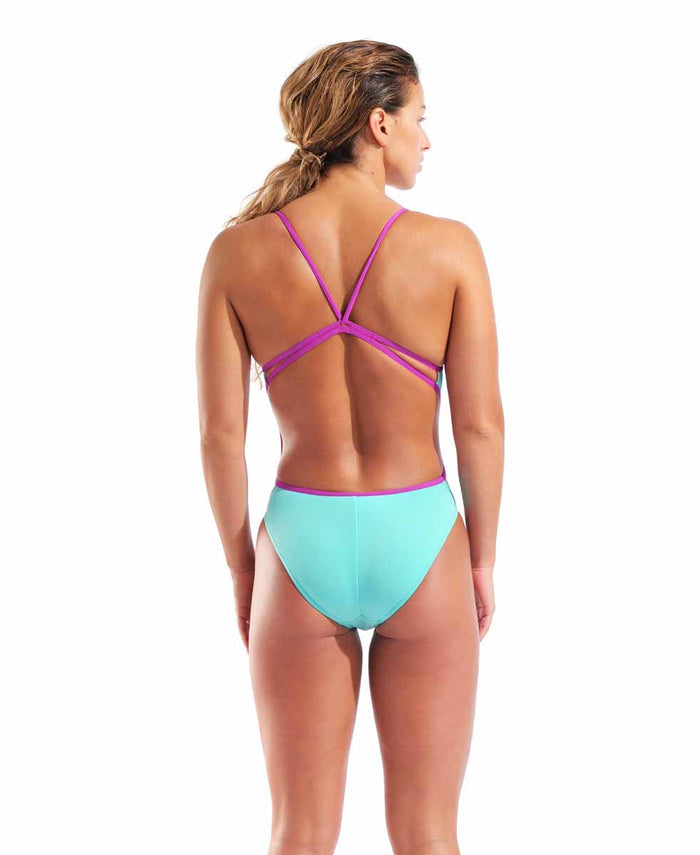 Arena women's lace solid swimsuit in vibrant water/very fuchsia color, featuring a fitted design and lace detailing.
