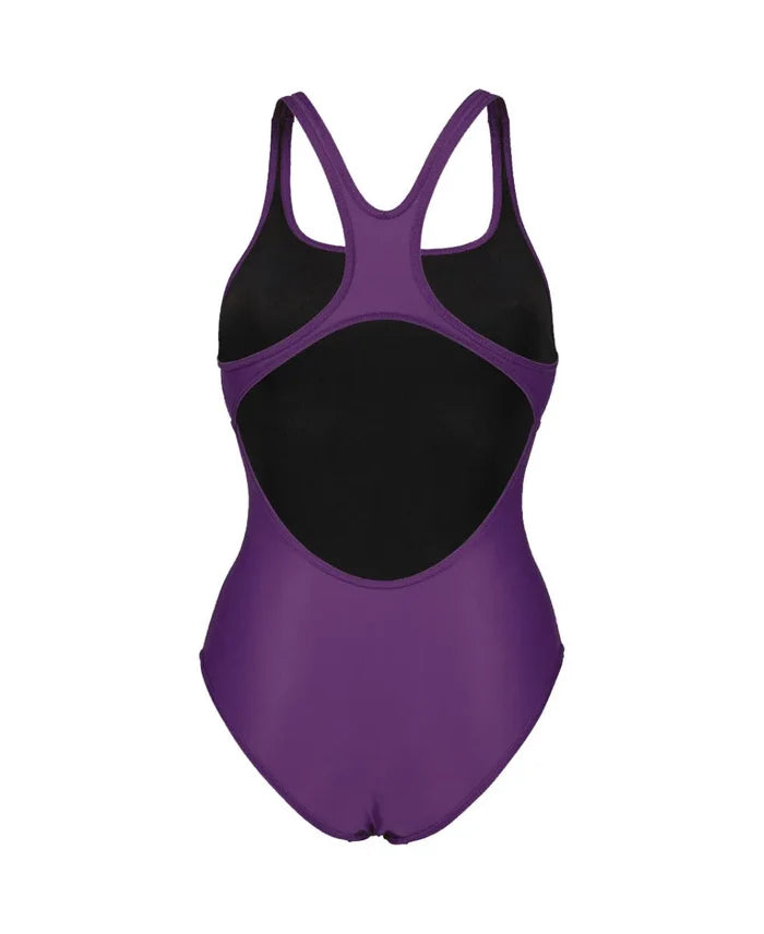 Arena women's solid Team Swim Pro swimsuit in plum and white, featuring a sleek, fitted design perfect for competitive swimming.