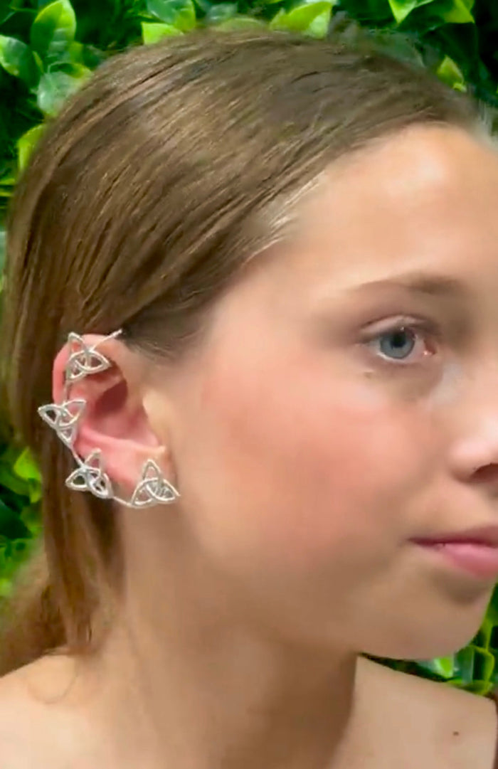 Silver Celtic knot elf ear cuffs worn along ear cartilage, side profile