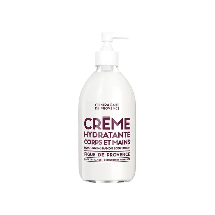 Bottle of Compagnie de Provence hand and body lotion on a white background