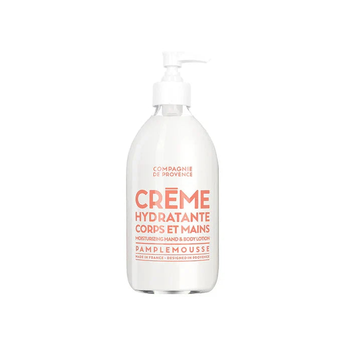 White bottle of Compagnie de Provence hand and body lotion with pink text on a white background