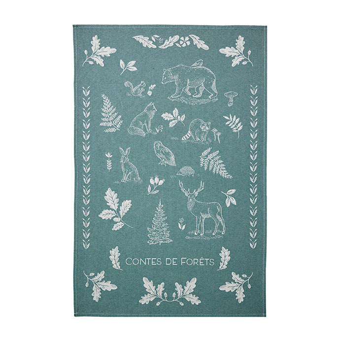 Teal towel with white forest animal and plant pattern on a white background