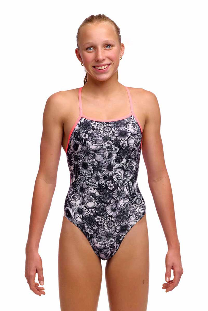 Funkita girls' one-piece swimsuit in black and white with rose pattern, designed for active swimming and comfortable fit.