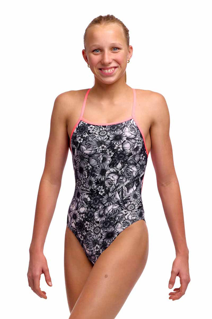 Funkita girls' one-piece swimsuit in black and white with rose tie detail, designed for swimming and active wear.