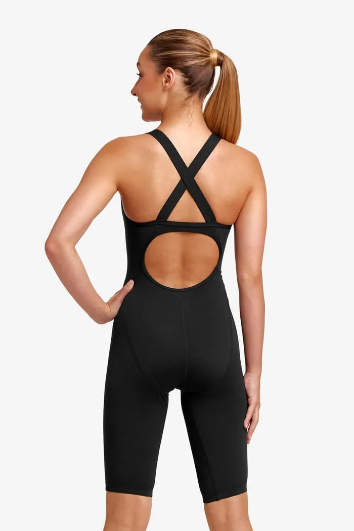 Funkita girls’ black still Fast Legs one-piece kneesuit, close-up of sleek black swimwear with stretchy fabric and high leg design.