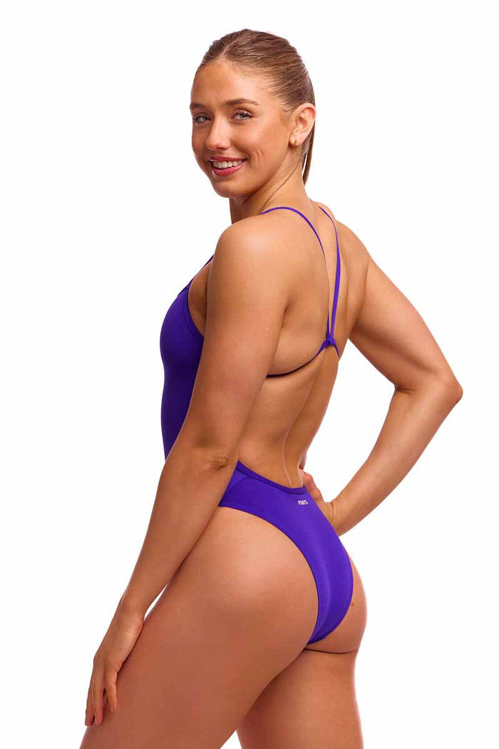 Funkita Ladies Still Purple single strength one-piece swimsuit in purple, featuring a sleek, fitted design for swimming.