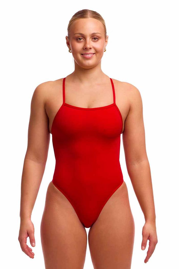 Funkita Ladies Still Red single strength one-piece swimsuit in vibrant red, designed for active swimming and athletic performance.