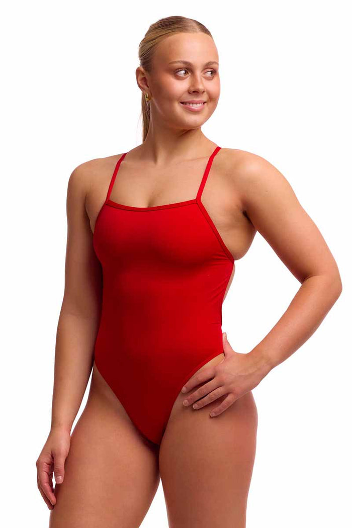 Funkita Ladies Still Red single strength one-piece swimsuit with sleek red design, suitable for competitive swimming.