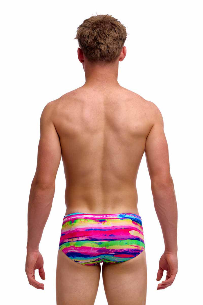 Funky Trunks Boys Paint Patch Sidewinder Trunks in vibrant multi-color with fun paint patch design, suitable for boys.
