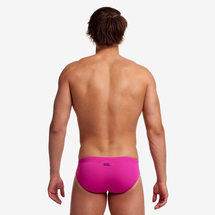 Funky Trunks men's Still Pink classic briefs in vibrant pink fabric, showcasing the snug fit and comfortable waistband.