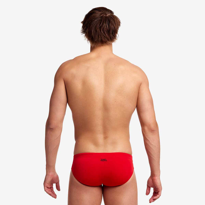 Funky Trunks men's Still Red classic briefs in vibrant red fabric, showcasing a snug fit and modern design.