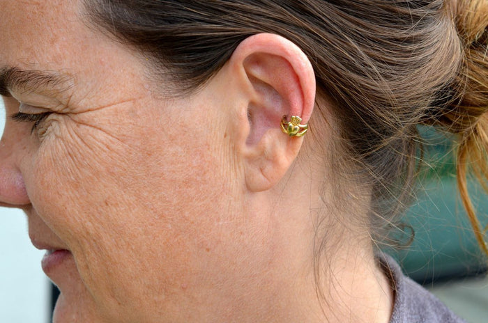 Model wearing Gold Claddagh Ear Cuff – Adjustable Non-Piercing Celtic Jewelry