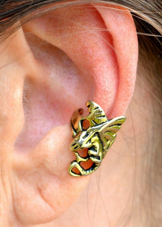 gold dragon ear cuff worn on ear non piercing earring side view