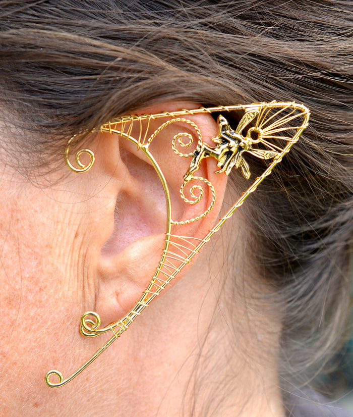 Model wearing gold fairy elf ear cuff, wire wrap non-piercing elven ear jewelry, side view