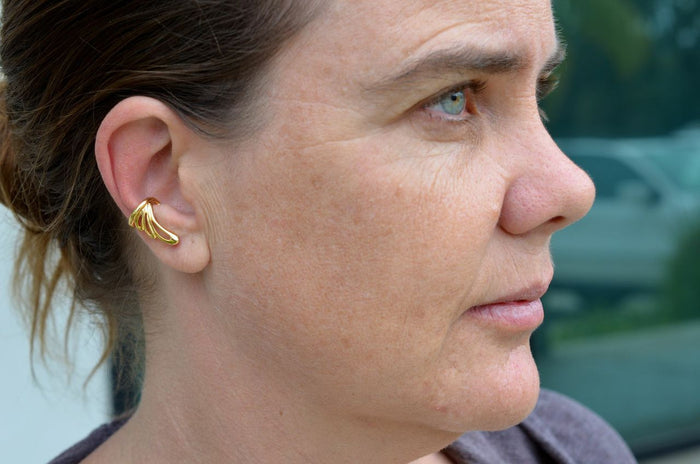 Model wearing Gold Flowy Wing Ear Cuff – Elegant Non-Piercing Jewelry