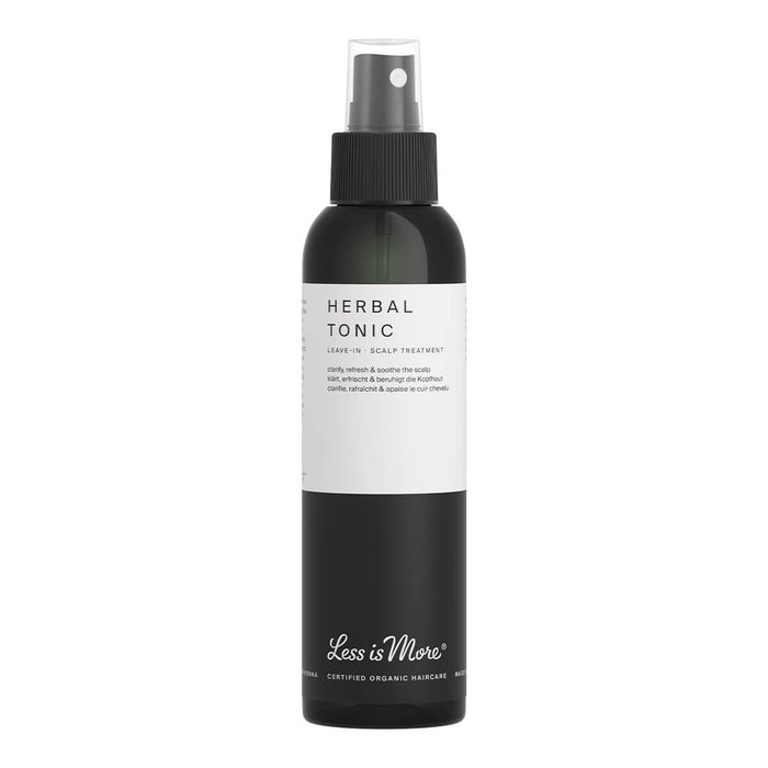 150ml bottle of Less is More Herbal Tonic with a spray cap, a leave-in scalp treatment designed to help alleviate scalp irritation for all hair types. This highly effective herbal tonic clarifies, refreshes, and soothes the scalp. Simple white label on a black bottle.