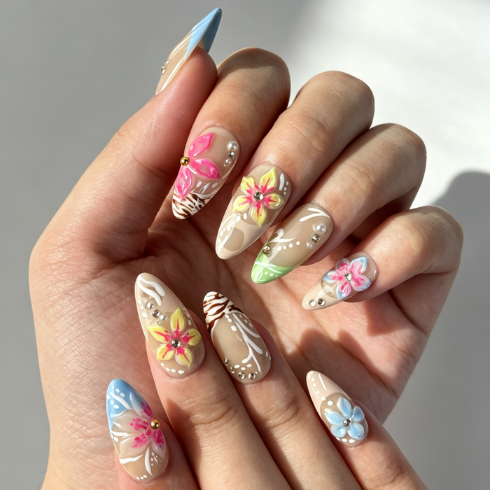 Close Up Hand Painted Nail Art, Tropical Plumeria Floral Decor, Nude Medium Almond Starfish Rhinestone Press On Nail Detail Shot