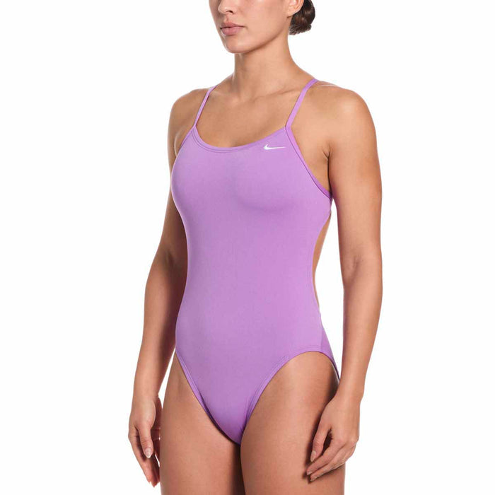 Nike Hydrastrong solid cutout one-piece swimsuit in bright violet, showcasing a stylish design with cutout details.
