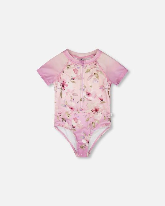 Front flat lay of Deux par Deux girl one-piece swimsuit in purple flower print