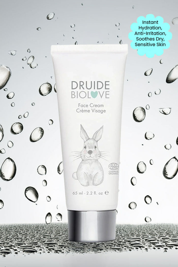 Druide Biolove organic baby face cream against background if water beads with text "instant hydration, anti hydration, soothes dry, sensitive skin".