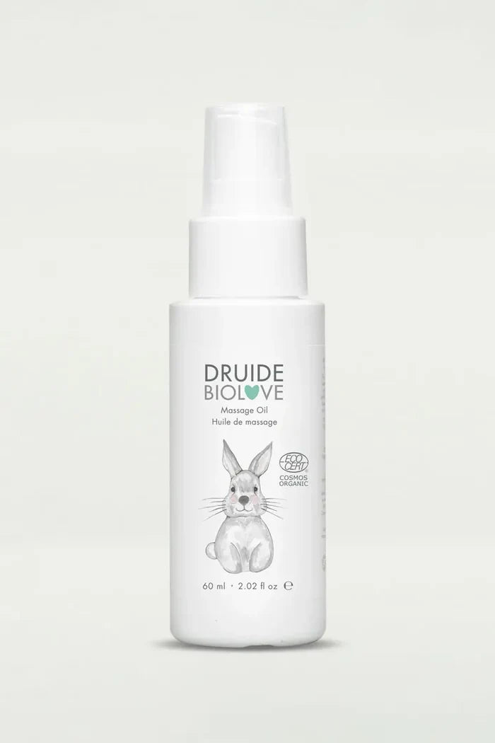 Druide Biolove organic massage oil dispenser of 60 ml with Ecocert certified COSMOS Organic icon, displayed on a clear background.