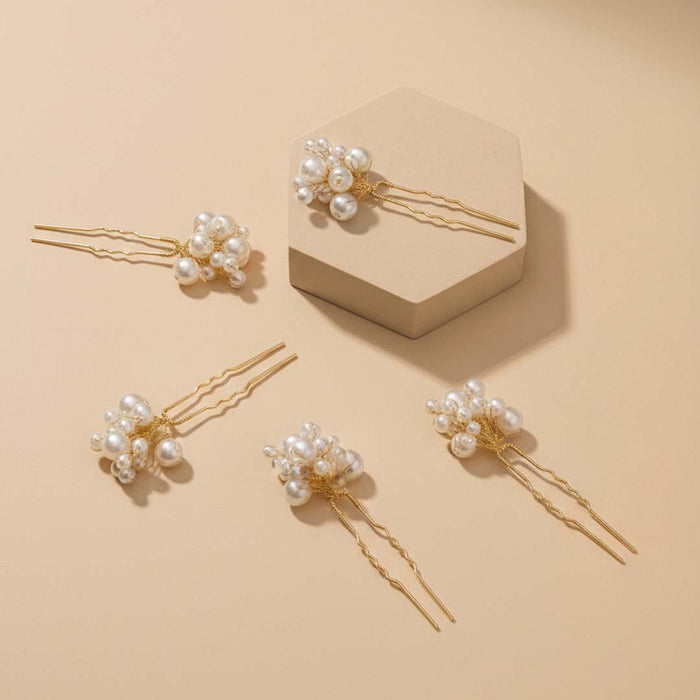 Clustered pearl hair pins on gold U pins, perfect for bridal buns, braids and festive updos