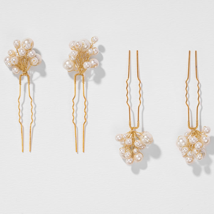 Delicate pearl hair pins with gold accents crafted for chic bridal and festive hair looks