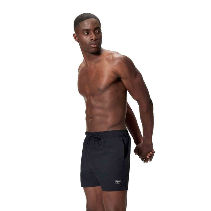 Black Speedo men's Essentials 16-inch swim shorts with an elastic waistband and quick-drying fabric.