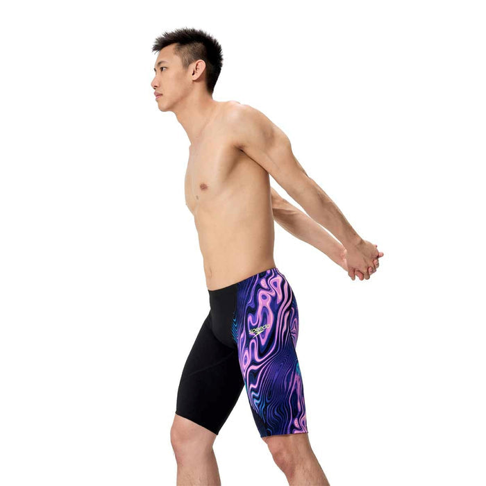 Speedo men's Fastskin LZR Ignite jammer in black and purple, designed for competitive swimming and aerodynamic performance.
