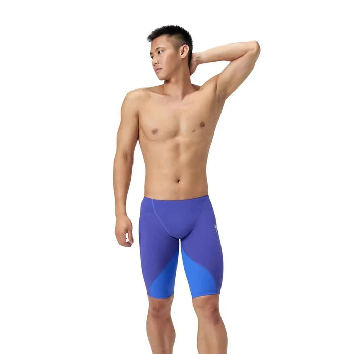 Speedo men's Fastskin LZR Ignite jammer in purple, close-up view of the form-fitting swim jammer for competitive swimming.