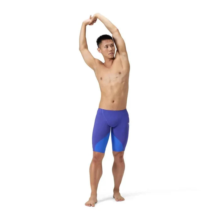 Speedo men's Fastskin LZR Ignite jammer in purple, close-up of sleek, fitted swimwear designed for competitive swimming.