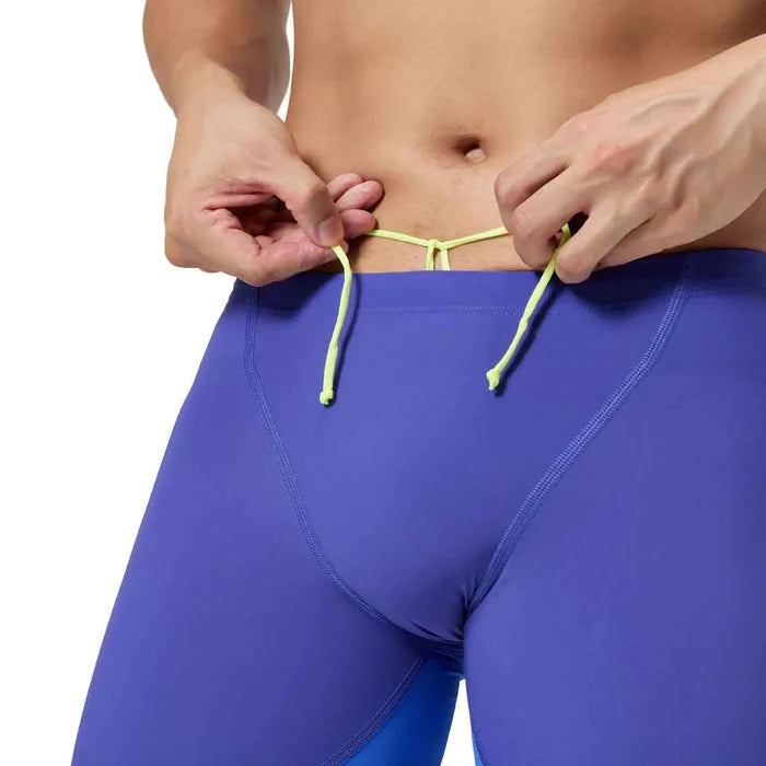 Purple Speedo men's Fastskin LZR Ignite jammer swimsuit for competitive swimming, featuring sleek, form-fitting design.