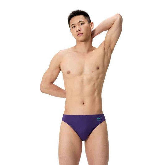 Speedo men's ML solid brief in acai purple, showing the snug-fit swimwear with the Speedo logo and smooth fabric.