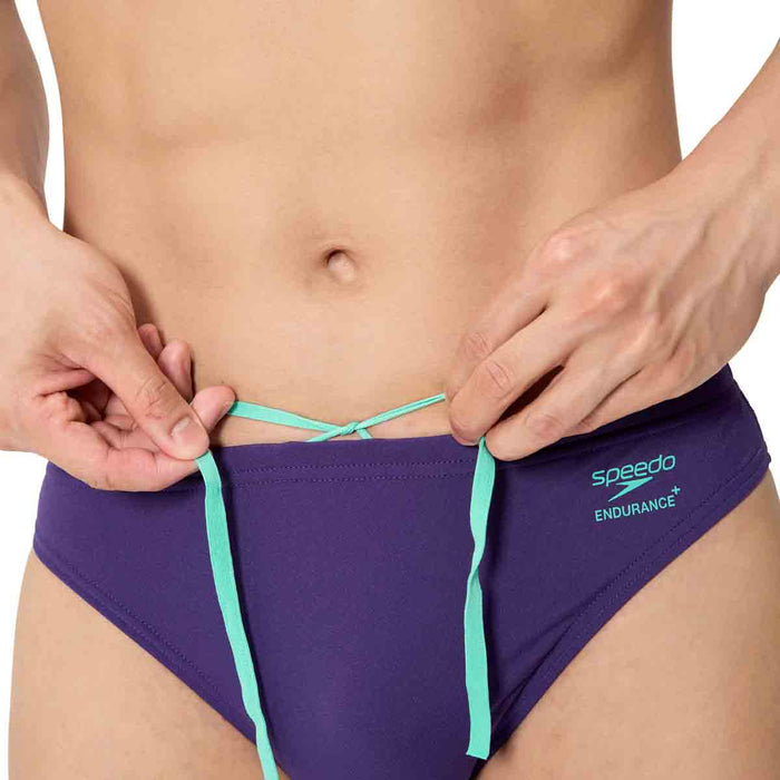 Speedo men's ML solid brief in acai purple, featuring a snug fit and durable swimwear fabric.