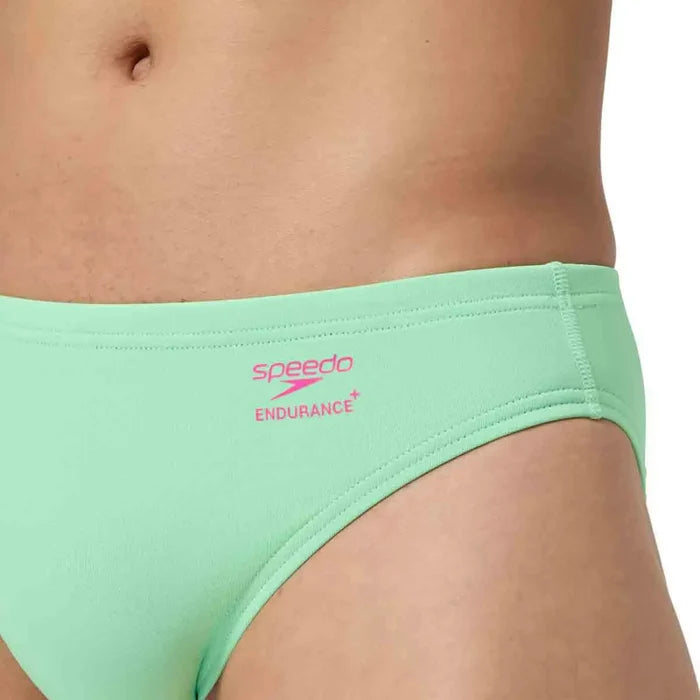 Speedo men's ML solid briefs in Alfalfa Green, lightweight swimwear with a snug fit, designed for comfort and durability.