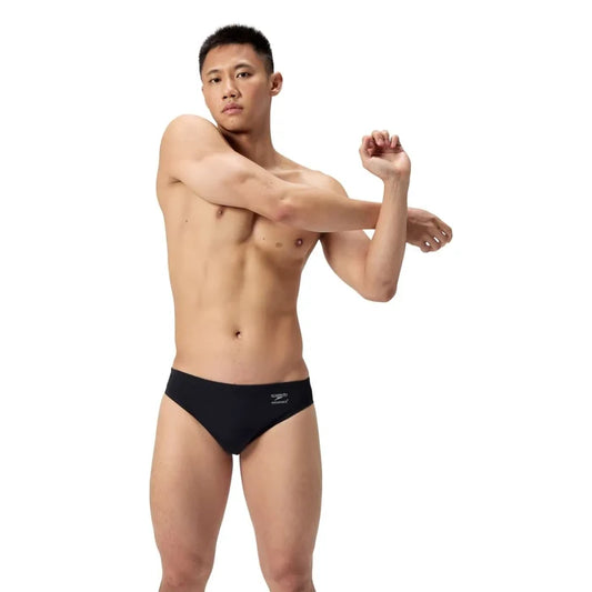 Speedo men's ML solid brief in Team Black, showing a close-up of the black swim brief with sleek design and elastic waistband.