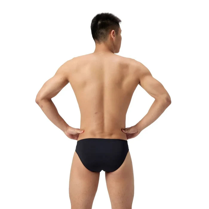 Speedo men's ML solid brief in black, featuring a snug fit and elastic waistband, designed for swimming and water activities.
