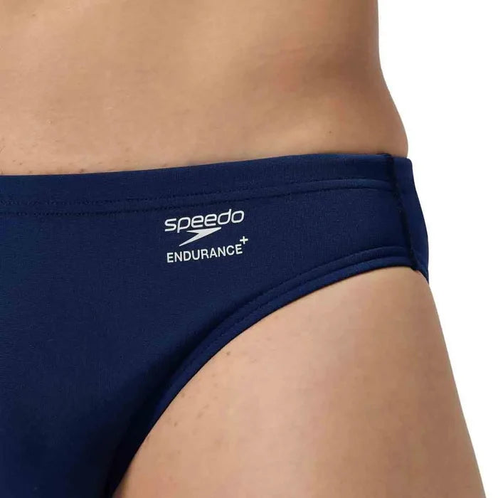 Speedo men's ML solid brief in navy blue, lightweight swimwear with a snug fit, designed for comfort and performance in the water.