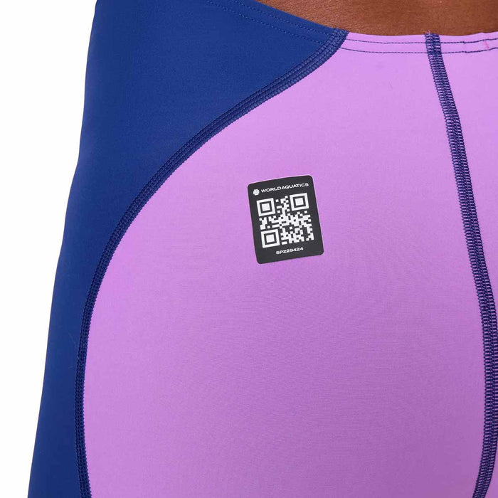 Speedo Women's Fastskin LZR Ignite Kneeskin swimsuit in navy and purple, close-up of the sleek, fitted racing kneesuit.