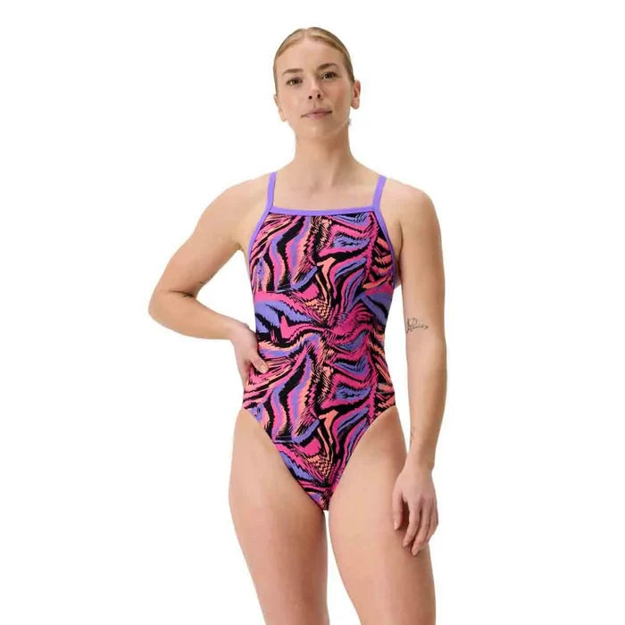 Speedo women's printed turnback swimsuit in Fusion Flare and Indigo Glow, featuring a sleek design and vibrant color pattern.
